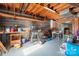 Unfinished basement with workbench and tools at 2356 Ben Yount Ln, Vale, NC 28168