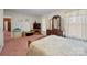 Bedroom with wooden bed frame and access to another room at 2356 Ben Yount Ln, Vale, NC 28168