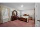 Bedroom featuring a wooden bed frame and ample closet space at 2356 Ben Yount Ln, Vale, NC 28168