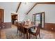 Bright dining room featuring a wooden table and access to the kitchen and backyard at 2356 Ben Yount Ln, Vale, NC 28168