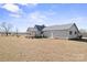 Rear view of house, showcasing the back porch and yard at 2356 Ben Yount Ln, Vale, NC 28168