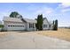 Ranch home with gray metal roof, attached garage, and large yard at 2356 Ben Yount Ln, Vale, NC 28168