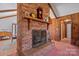 Brick fireplace as a focal point in the living room at 2356 Ben Yount Ln, Vale, NC 28168