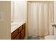 Simple bathroom with single vanity, shower, and toilet at 2519 Early Flight Dr, Charlotte, NC 28262