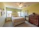 Bright bedroom with neutral walls and a ceiling fan at 2519 Early Flight Dr, Charlotte, NC 28262