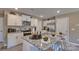 Modern kitchen with white cabinets and granite island at 3024 Ora Smith Rd, Lincolnton, NC 28092