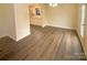 Spacious dining area with hardwood floors and adjacent kitchen at 310 Ann Baker Ct, Charlotte, NC 28217