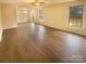 Spacious living room with hardwood floors and lots of natural light at 310 Ann Baker Ct, Charlotte, NC 28217