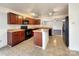 Kitchen with island and dark wood cabinets at 3418 Pikes Peak Dr, Gastonia, NC 28052