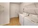 Laundry room with washer, dryer, and shelving at 3418 Pikes Peak Dr, Gastonia, NC 28052