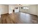 Open living room with kitchen view and hardwood floors at 3418 Pikes Peak Dr, Gastonia, NC 28052