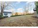 Large backyard featuring a shed and an outdoor sitting area at 346 Almora Loop, Mooresville, NC 28115