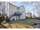 Back exterior of home featuring the deck, patio, and walkout basement at 346 Almora Loop, Mooresville, NC 28115