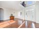 Bright foyer with hardwood floors, high ceilings, chandelier, and wainscoting at 346 Almora Loop, Mooresville, NC 28115