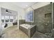 Bathroom with soaking tub, walk-in shower, and tile flooring at 41071 Calla Lily St, Fort Mill, SC 29707