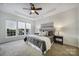 Main bedroom with plush carpet and a ceiling fan at 41071 Calla Lily St, Fort Mill, SC 29707