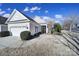 Single-story home with attached garage and manicured landscaping at 41071 Calla Lily St, Fort Mill, SC 29707