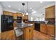 Spacious kitchen with granite island and stainless steel appliances at 41071 Calla Lily St, Fort Mill, SC 29707