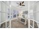 Home office with built-in desk and French doors at 41071 Calla Lily St, Fort Mill, SC 29707