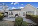 Spacious patio with seating area, grill, and lush landscaping at 41071 Calla Lily St, Fort Mill, SC 29707