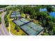 Well-maintained tennis courts nestled in a green landscape at 41071 Calla Lily St, Fort Mill, SC 29707