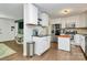 Modern kitchen featuring stainless steel appliances, white cabinetry, and granite countertops at 4321 Gillespie Ct, Charlotte, NC 28205