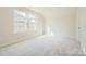 Spacious bedroom with carpet and two large windows at 4474 Doyle Ridge Rd, Maiden, NC 28650