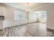 Bright dining room with hardwood floors and an arched entryway at 4474 Doyle Ridge Rd, Maiden, NC 28650