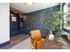 Stylish office with patterned wallpaper and a modern desk setup with a brown leather chair at 506 Campus St, Charlotte, NC 28216