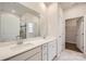 Double vanity bathroom with white cabinets and a large mirror, providing an elegant feel at 5901 Oak Branch Cir, Maiden, NC 28650