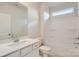 Clean bathroom with a shower/tub combo and a white vanity at 5901 Oak Branch Cir, Maiden, NC 28650