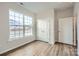 Well-lit bedroom with hardwood floors and double door closet at 5901 Oak Branch Cir, Maiden, NC 28650