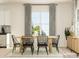 Dining area with wooden table, black chairs, and large windows at 5901 Oak Branch Cir, Maiden, NC 28650