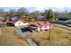 Expansive aerial view showcasing the house, detached garage and surrounding property at 601 N 12Th St, Bessemer City, NC 28016