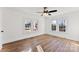 Bedroom with natural light and wood-look flooring at 601 N 12Th St, Bessemer City, NC 28016