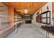 View of the garage interior featuring shelves and an air conditioner at 601 N 12Th St, Bessemer City, NC 28016