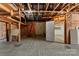 View of the garage interior showing walls and concrete floor at 601 N 12Th St, Bessemer City, NC 28016