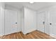 Hallway with two doors and wood floors at 601 N 12Th St, Bessemer City, NC 28016