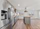 Modern kitchen featuring stainless steel appliances and butcher block countertops and shelves at 601 N 12Th St, Bessemer City, NC 28016