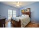 Bedroom with double bed and wood floors at 6238 Mountain Vine Ave, Kannapolis, NC 28081