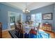 Bright dining room with hardwood floors and view to kitchen at 6238 Mountain Vine Ave, Kannapolis, NC 28081