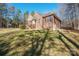 Brick home with a covered porch and landscaped yard at 6238 Mountain Vine Ave, Kannapolis, NC 28081