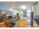 Modern kitchen with white cabinets, granite countertops, and stainless steel appliances at 6238 Mountain Vine Ave, Kannapolis, NC 28081