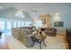 Spacious living room with vaulted ceiling, stone fireplace, and sunroom at 6238 Mountain Vine Ave, Kannapolis, NC 28081