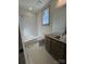 Bathroom featuring a soaking tub, toilet and vanity at 718 Barrel Aly, Fort Mill, SC 29715