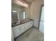 Bathroom with double vanity and a large mirror at 718 Barrel Aly, Fort Mill, SC 29715