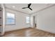 Bright bedroom with hardwood floors, ample natural light, and neutral color palette at 718 Barrel Aly, Fort Mill, SC 29715