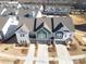 Aerial view of newly built townhomes in a suburban neighborhood at 8125 Houser St, Cornelius, NC 28031