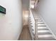 Hallway with a view of the front door and staircase at 8125 Houser St, Cornelius, NC 28031