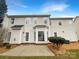 Two-story house with a patio and spacious backyard at 8200 Suttonview Dr, Charlotte, NC 28269